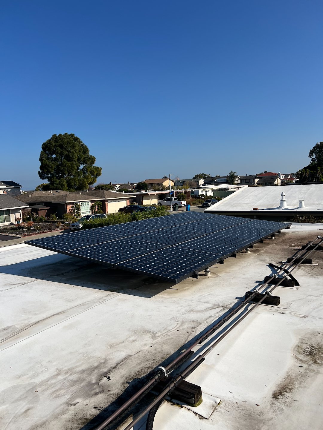 Foster City Rooftop Solar Installation – Flat Roof, Tilt Racking, and Net Zero Power